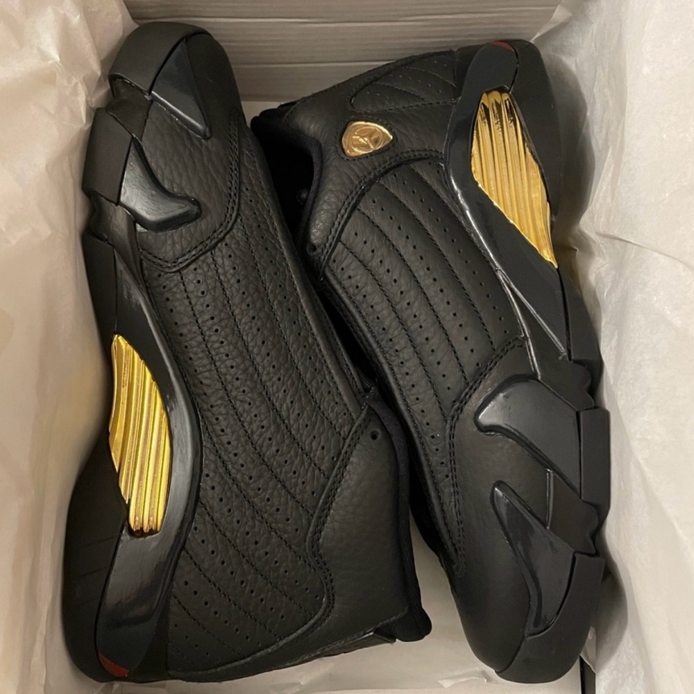 Nike Black and Gold Sneakers with Sporty Design